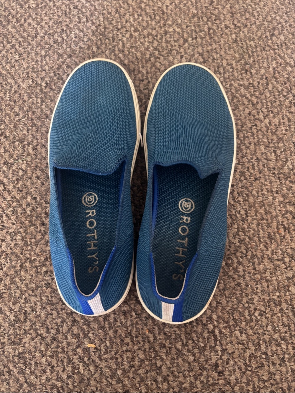 Rothy's Blue Slip-On Sneakers with White Heel Stripe